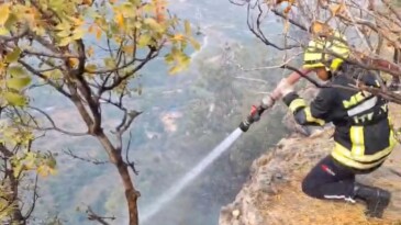 Makilikte çıkan yangın bahçelere ulaşmadan söndürüldü